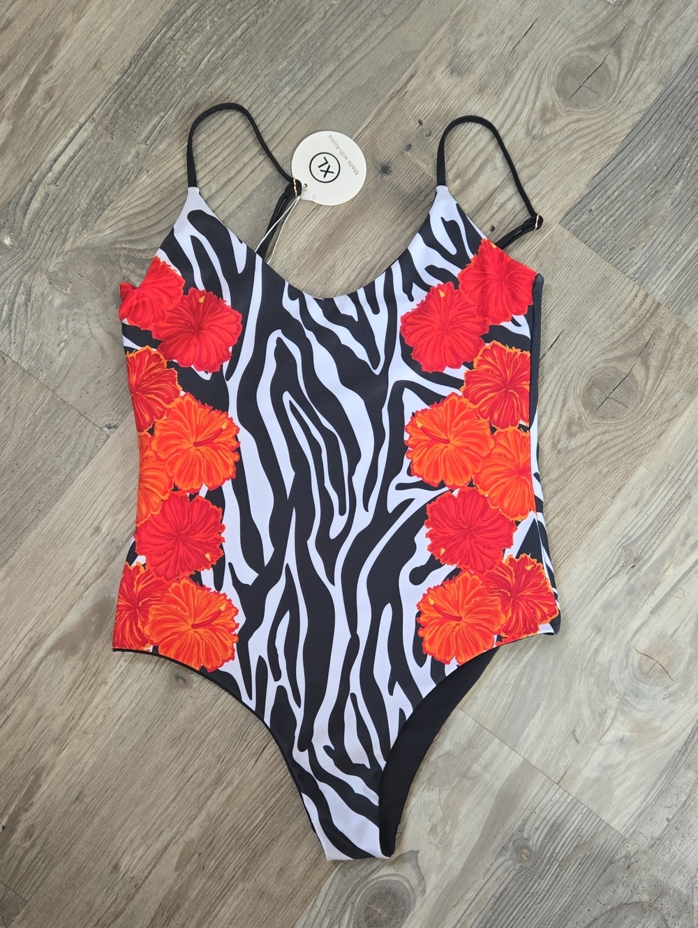 Black & White Zebra One-Piece Swimsuit with Red-Orange Floral Trim